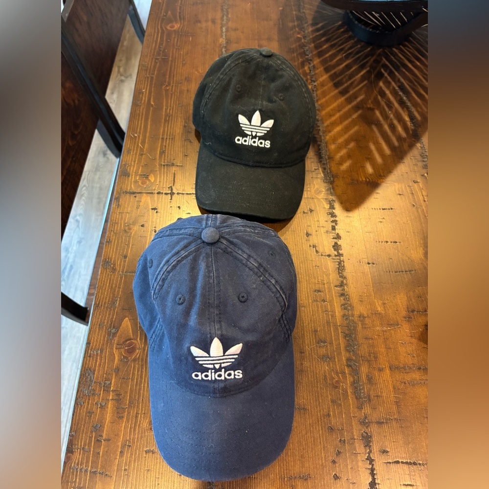 2 Adidas Black and Blue hats.